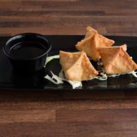Crab Rangoon (6) · Homemade and served with sweet and sour.