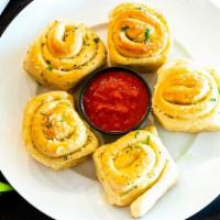 Squisito® Garlic Knots (6) · Served with our Squisito®  marinara sauce.