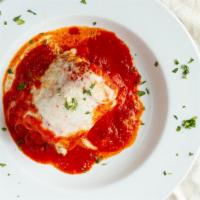 Lasagna Bolognese  · Our homemade baked lasagna with ground beef and our ricotta cheese blend, topped with tomato...