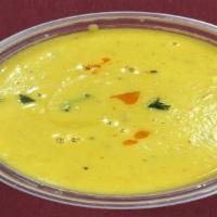Mulligatawny Soup · Lentils blended with fresh spices and topped with cilantro.