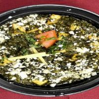 Palak Paneer · Fresh ground Spinach cooked with chunks of our homemade paneer. (Indian cheese).