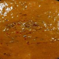 Dal Makhani · An assortment of lentils cooked with fresh onion, ginger, garlic and butter.