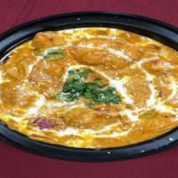 Chicken Tikka Masala · Boneless pieces of chicken cooked with fresh cream and flavored with fresh Indian herbs.