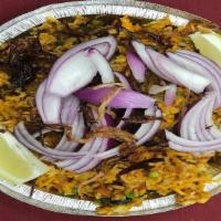 Vegetable Biryani · Basmati rice cooked with fresh vegetables and spices.