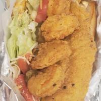 Fish And Shrimp Po Boy · Served on a toasted hoagie style bun with lettuce, tomatoes, purple onions, pickles and chee...