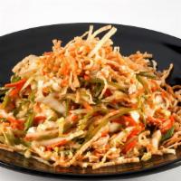 Asian Chicken Salad · Choice of grilled or breaded chicken, crispy noodles, and almonds tossed with salad greens i...