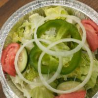 Garden Salad · Lettuce, cucumber, tomato, bell pepper, and onion.
Side of dressing.