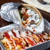 Gyro Wrap Come With Fries · gyro  topped with lettuce, tomatoes, red onion ,cucumber  white sauce and spicy red sauce. W...