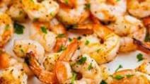 Char-Grilled Shrimp · Boldly marinated shrimp char-grilled & served on grilled garlic bread with house-made remoul...