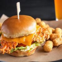Crispy Buffalo Chicken Sandwich · Beer-infused. Lightly hand-breaded beer-brined chicken breast tossed in spicy buffalo sauce ...
