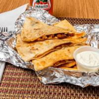 Chicken Quesadilla · Chicken and Cheese Quesadilla serve with your Choice Sauce 
Red, White or Green