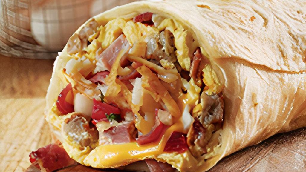 Hog Heaven Burrito · It is packed with 3 cage-free eggs, 2 slices of American cheese, hash browns, fresh salsa, hickory-smoked bacon, sausage, and country ham all wrapped up in a warm tortilla. Come get it before it’s gone!