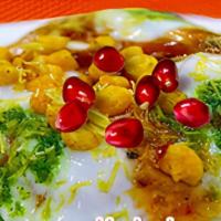 Khasta Kachori Chaat  · Deep fried, puffed pastry stuffed with spicy moong dal stuffing