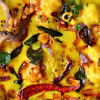 Rajasthani Pakoda Kadhi · spicy sour yogurt and gram flour based curry with crispy fried vegetable Pakora 
simmered in...