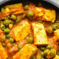 Matar Paneer · Indian cottage cheese cooked with green peas