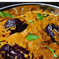 Aloo Baingan Masala · Potatoes, small egg plant cooked in a special sauce