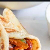 Veg Kathi Rolls · Whole wheat flour, cabbage, bell peppers, tomato sauce, chili