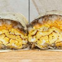 The Breakfast Burrito · Flour tortilla filled with eggs, refried beans, hash browns, and Mexican cheese.