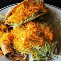 Beef Taco Special · Beef taco, bean tostada, rolled taco with cheese