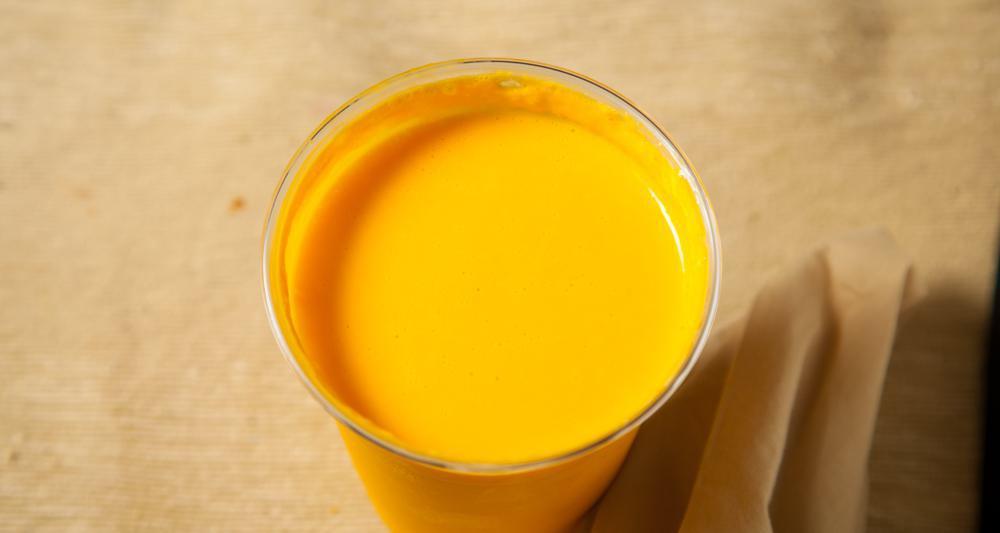 Mango Lassi · Mango lassi is made from yogurt, milk, mango pulp and sugar.