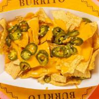 Nachos · Crisp deep fried corn tortilla chips covered with cheddar cheese sauce, with a side of jalap...