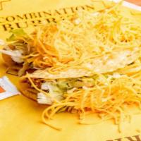 Taco · A crisp deep fried corn tortilla filled with 100% ground beef, fresh shredded lettuce and to...