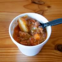 Green Chili Stew · Hot and flavorful chicken base stew consisting of mild green chiles, onions, potatoes, carro...