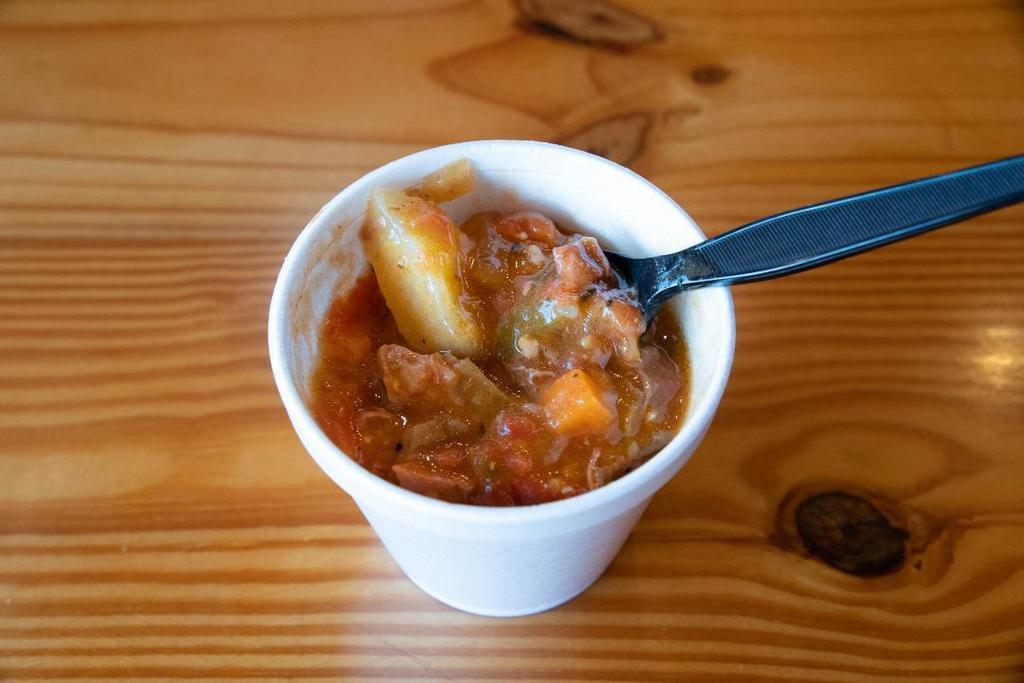 Green Chili Stew · Hot and flavorful chicken base stew consisting of mild green chiles, onions, potatoes, carrots, tomatoes, chopped brisket, and special seasonings – not very spicy.