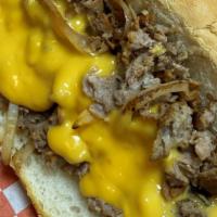 Whiz · choice of steak or chicken with grilled onions & cheese whiz (liquid cheese)