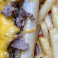 Kids Cheesesteak + Fries · choice of steak or chicken & yellow cheese served with fries