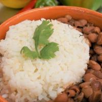 Refried Beans · Cooked in a sweet and savory sauce.