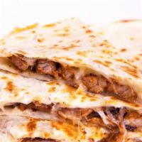 Large Soft Taco · Street style taco with 6 inch grilled soft corn tortillas, choice of meat, cilantro, onion, ...