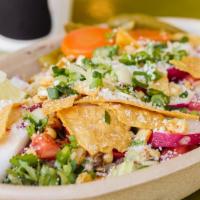 Taco Salad · Your choice of meat, and beans on a bed of lettuce served up with onion, tomato, cilantro, c...