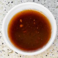 Tamarind Hot Sauce · Sweet and spicy.