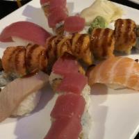 Crazy Maki · Inside: Shrimp tempura
Outside: Spicy tuna, spicy salmon, and eel sauce