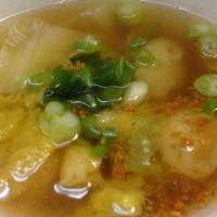 S 12. Wonton Soup · Minced chicken and shrimp, wrapped in wonton skin wrap, Napa cabbage, in special chicken bro...