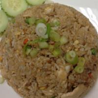 E-18 Fried Rice · Stir fried egg, finely chopped onion, carrot, pea, cucumber slices on side