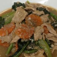 E-13A Lad Na · Flat rice noodle topped with stir fried broccoli, carrot  in Brown gravy sauce