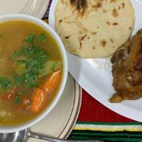 Sopa De Gallina · Free-range raised chicken soup with vegetables.