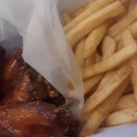 Big Kids Wings · Four wingettes tossed in your sauce of choice and your choice of fries.