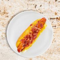 Dirty Bacon Cheese Hot Dog · Hot Dog with melted cheese and bacon.
