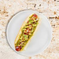 Best Of Boston Hot Dog · Hot Dog with yellow mustard, green relish, chopped onions, red tomato, pickle, and peppers.