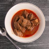 Stewed Beef/Carnes De Res Guisada   · 1 lb