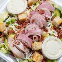 Chef Salad  · Ham, turkey, crumbled bacon, iceberg lettuce, tomatoes, cucumbers, onions, green peppers, sh...