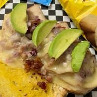 Turkey Avocado Melt · Roasted turkey breast, crumbled bacon, avocado, onions on a toasted sub roll and covered wit...
