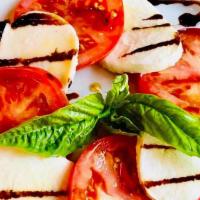 Caprese · Fresh, Sliced Tomato and Fior di Latte with Basil, Aged Balsamic, EVOO