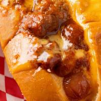 Chili Cheese Dog · 1/4 lb all beef hot dog smothered with chili and cheese served on our fresh baked Italian br...