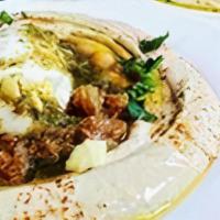 Hummus Sabich · OUR HOMEMADE DELICOUS HUMMUS TOPPED W/ EGGPLANTS,CHICKPEAS,HARD BOILED EGG,TAHINI,OLIVE OIL,...