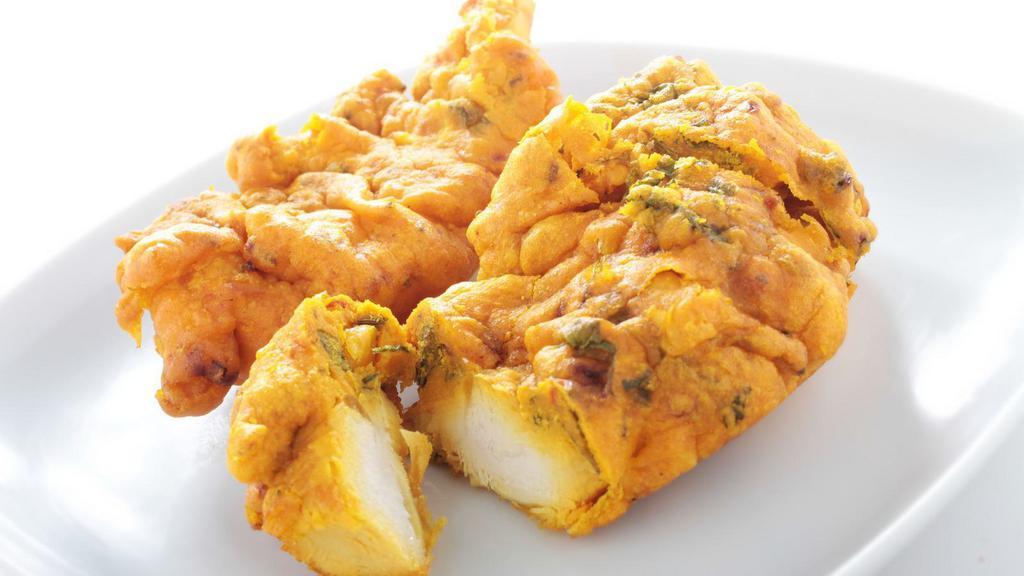 Chicken Pakoras · Delicately spiced chicken fritters.