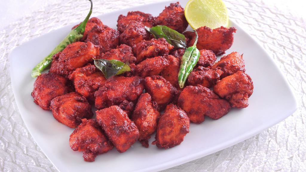 Chicken 65 · Delicious marinated chicken with curry leaves.